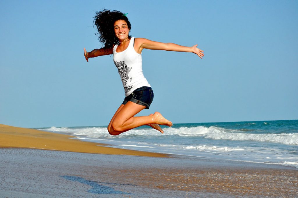 Person walking in nature, full of energy and vitality.