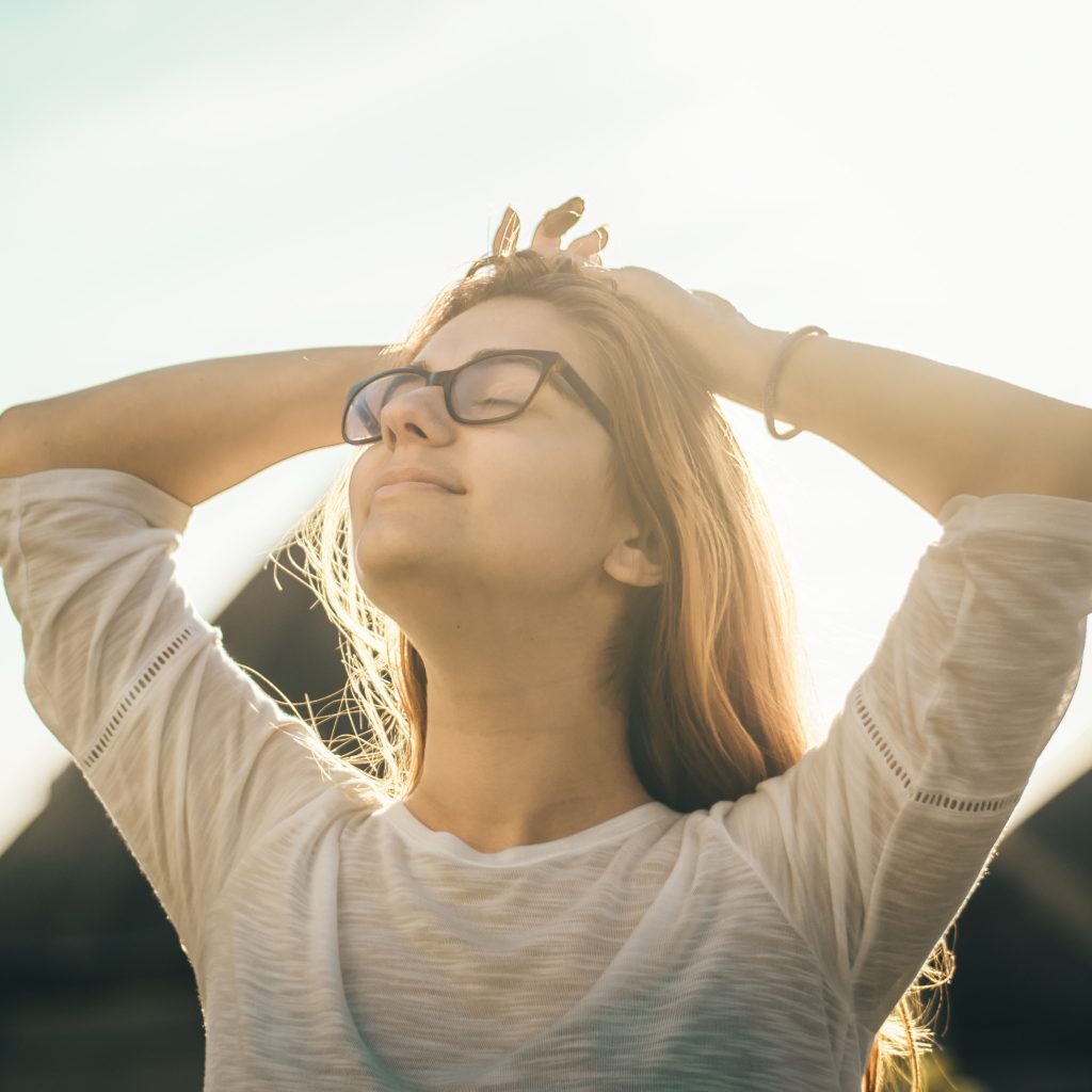 Relaxed, healthy, and confident woman after detox and weight loss program at Awaken and Bloom in Salt Lake City