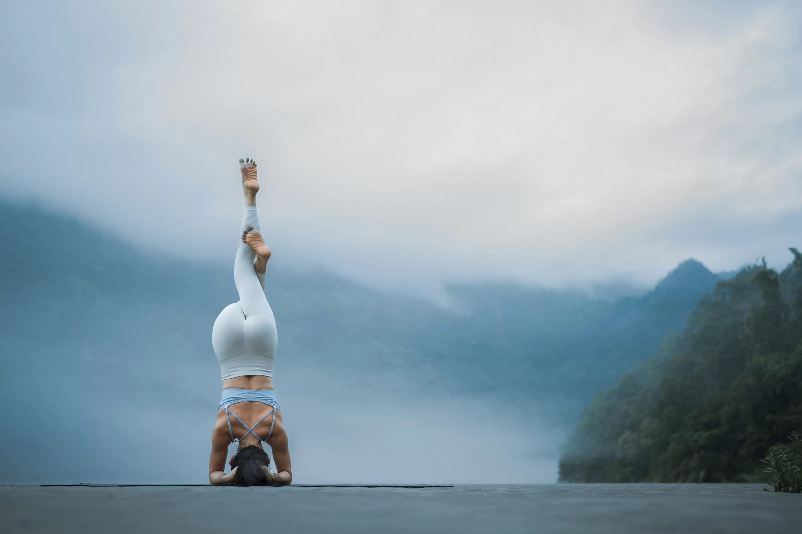 Woman practicing yoga for holistic wellness in Salt Lake City